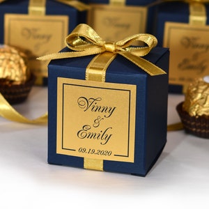 Navy Blue wedding favor boxes for guests. Elegant Wedding bonbonniere. Personalized Candy box with Gold satin ribbon bow and custom tag.