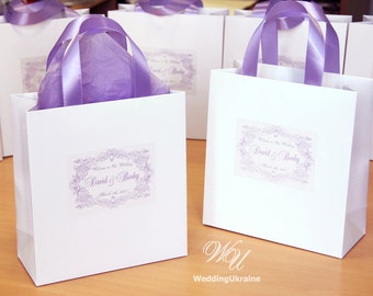 Gepersonaliseerde bruiloft welkomsttassen met lavendel satijnen lint en tag - papieren geschenkzakken voor uw gasten - aangepaste bruiloft geschenken en gunsten