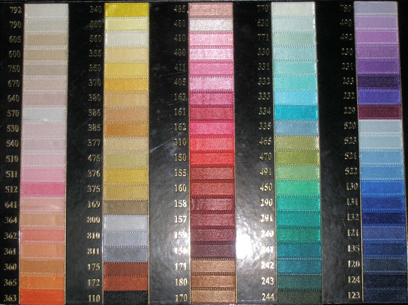 May include: A colour chart with rows of different coloured threads, numbered from 110 to 792. The chart is divided into 10 columns, each with a different colour range.