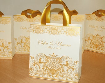 35 eleganter eleganter Willkommensbeutel in Elfenbein und Gold mit Satinbandgriffen und Ihren Namen