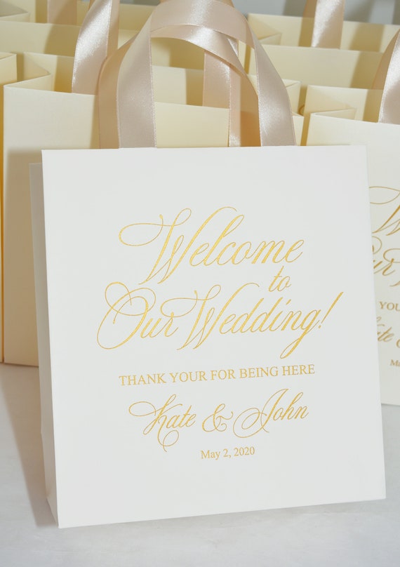 25 bolsos de bienvenida de la boda de marfil y champan bolso personalizado de oro elegante con asas de cinta de raso y sus nombres. Favores Chic para los huespedes Etsy Espana