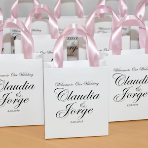 30 Welcome to Our Wedding Bags for Wedding guests with Light Pink satin ribbon handles and your names Personalized wedding favor for guests