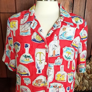 Red Button Down Short Sleeve Blouse with Message in a Bottle Style Snow Globes by Alia Petites, Size 10