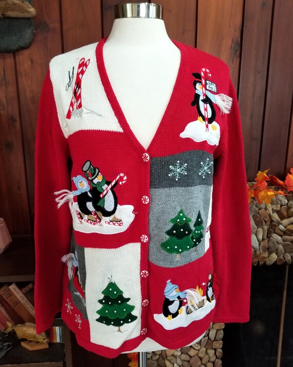 ThriftingNifty Red and White Christmas V-Neck Cardigan with Penguins Doing Winter Activities by White Stag, Size M