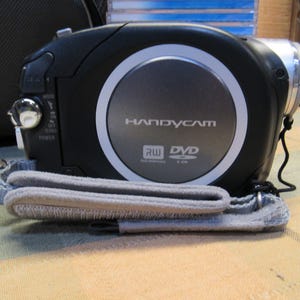 Sony DCR-DVD92 Handycam Digital Movie & Still Capture Camcorder Camera Carl Zeiss Vario Tessar Preowned and Like New. Barely used.