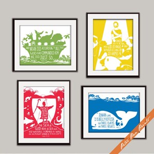 May include: Four framed prints with colorful backgrounds and white silhouettes of biblical scenes. The prints feature text from the Bible, including "And Noah did according to all that God had commanded him. He did just so." and "Moses now stretched out his hand over the sea. God drove the sea back. The waters formed a wall on their right hand and on their left."