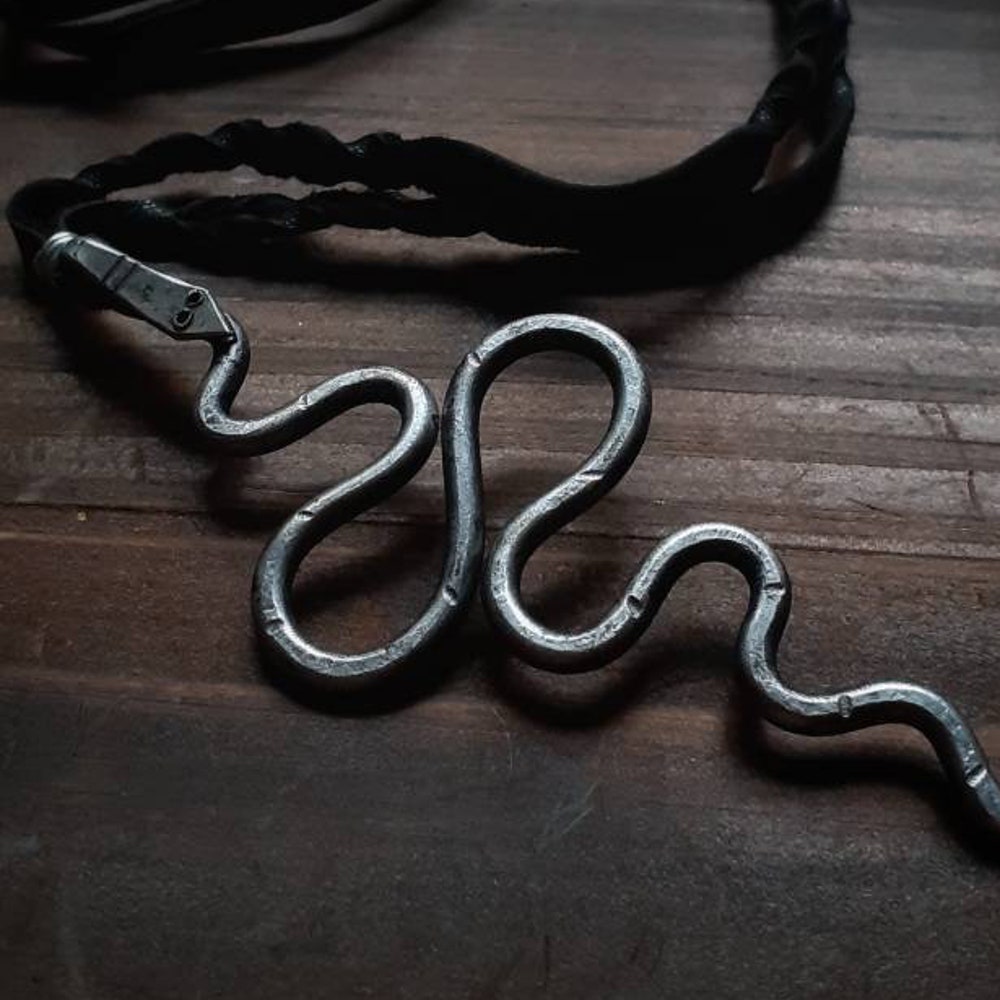 Serpent charm necklace