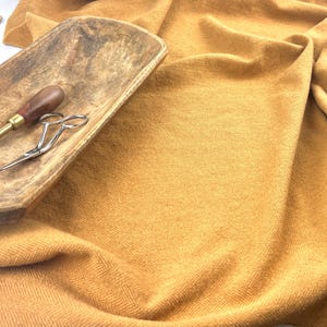 100% Wool Fat 1/4&#39;s (16&quot;x28&quot;), used for rug hooking, sewing, appliqué, and crafts.  Washed felted ready for your next project. SAUCY GOLD