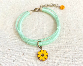 Mint green bracelet with Czech glass flower beads and mint glass bead strand . 2 strand bracelet . choose your length + 1" chain