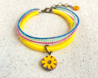 Bright yellow bracelet w/ Czech glass flower beads and mint, fuchsia & indigo bead strands. 4 strand bracelet. choose your length + 1" chain