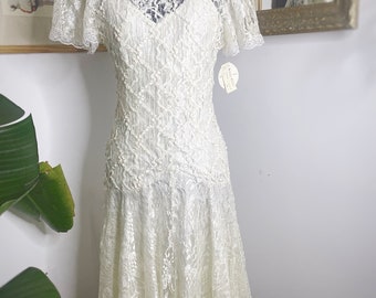 Lovely vintage white sequin and lace dress with tags