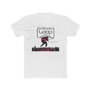 May include: White t-shirt with a graphic promoting Ed Sheeran's "Loop Tour." The design includes a cassette tape, a silhouette of Sheeran playing guitar, and the text "NORTH AMERICA 2020."