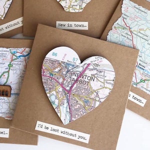 Valentines card with wooden heart covered in map of your choice