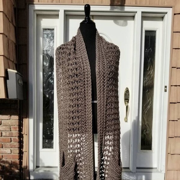 a shawl with pockets