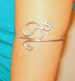 Innovative upper arm cuff armband made of brass or aluminium wire. 
