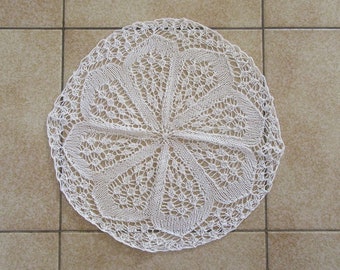Art knitted placemat. Handmade needle lace in extra fine beige cotton.