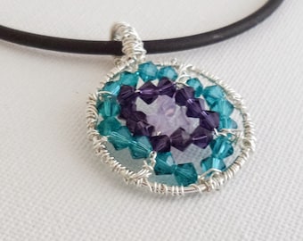 Kaleidoscope sterling silver pendant with turquoise, purple and rose pink crystal beads, perfect for summer days and nights