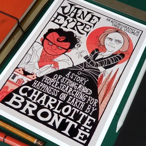 May include: A vintage-style illustration of the book cover for Jane Eyre by Charlotte Bronte. The cover features a red and black illustration of two people, a man and a woman, with the title of the book in large, black letters.