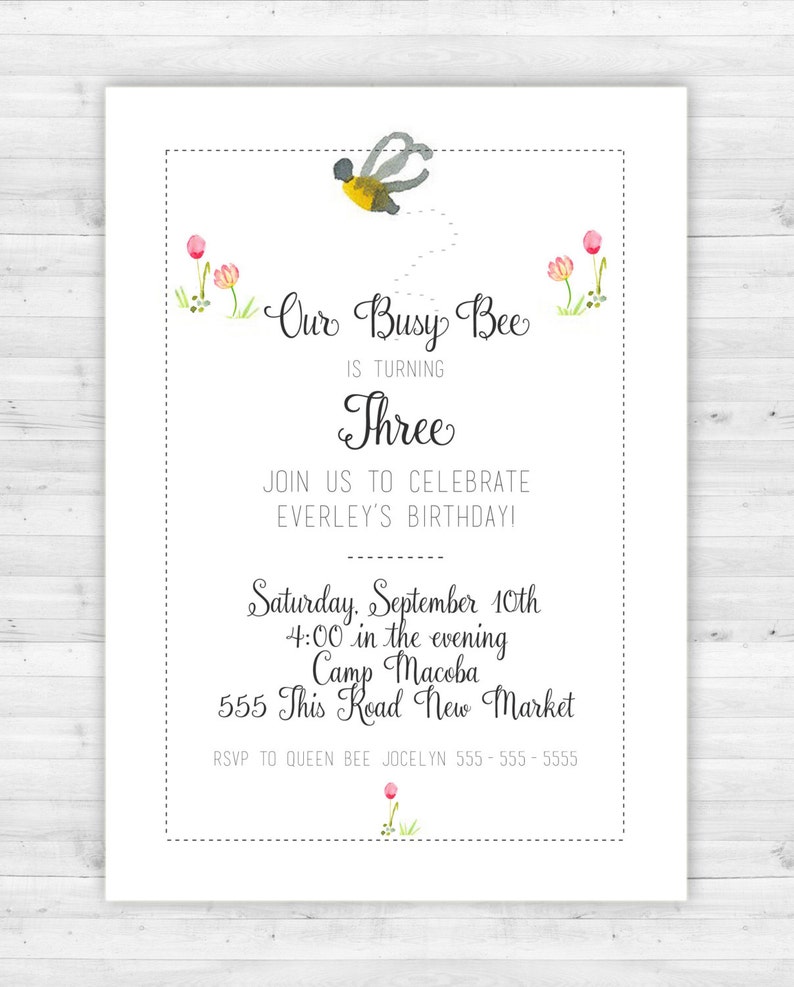May include: A white invitation card with a watercolor illustration of a bee and flowers. The text reads "Our Busy Bee is Turning Three. Join us to celebrate Everley's Birthday! Saturday, September 10th 4:00 in the evening Camp Macoba 555 This Road New Market RSVP to Queen Bee Jocelyn 555-555-5555"