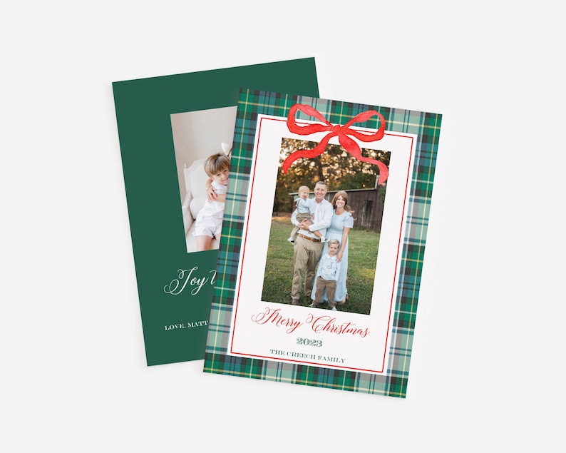 May include: A Christmas card with a green plaid background and a red bow. The card features a photo of a family of four standing in a grassy field. The text "Merry Christmas 2023 The Creech Family" is printed on the card.