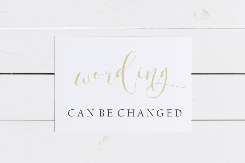 May include: White card with the word "wording" written in gold cursive script. Below the word is the text "CAN BE CHANGED" in black.