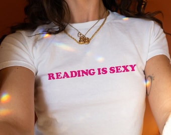 Reading is Sexy Baby Tee, Funny Slogan Text Tee, Aesthetic Tee, Women's Fitted Tee, Unisex Shirt, Trendy Top, Y2K 90s Baby Tee