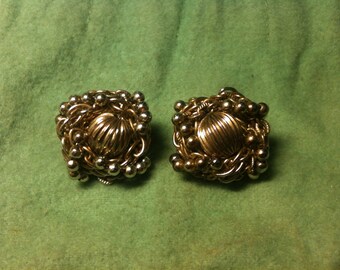 Clip-on earrings in gold tone. Steam Punk, chains, beads. Made in Japan or ARAN brand