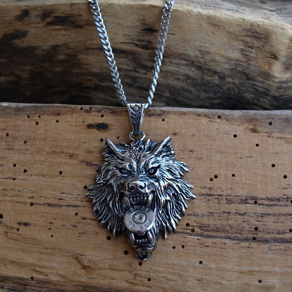 Heavy Duty Stainless Steel Bullet Wolf Necklace. Your Choice of 380, 9, 38, 40 or 357 Bullets.  Optional Crystal.