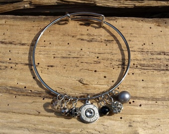 Stainless Steel Bangle Bracelet with 45 Auto Bullet and Gray Beads. Optional Crystal on the Bullet Charm. B-425