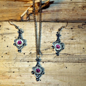 Handmade Bullet Necklace & Earrings. Comes with 9mm or 40 Bullet. Available with or without Swarovski Crystals. S-611 Silver or Gold