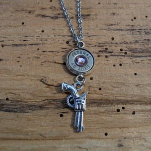 Stainless Steel 45 Auto Bullet Necklace with Revolver Charm. Brass or Nickel Bullets. Optional Swarovski Crystals. Ns-679