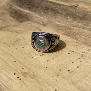 Stainless Steel Bullet Ring with Eagles and Nickel 45 Auto Bullets. Optional Swarovski Crystal on the Primer.