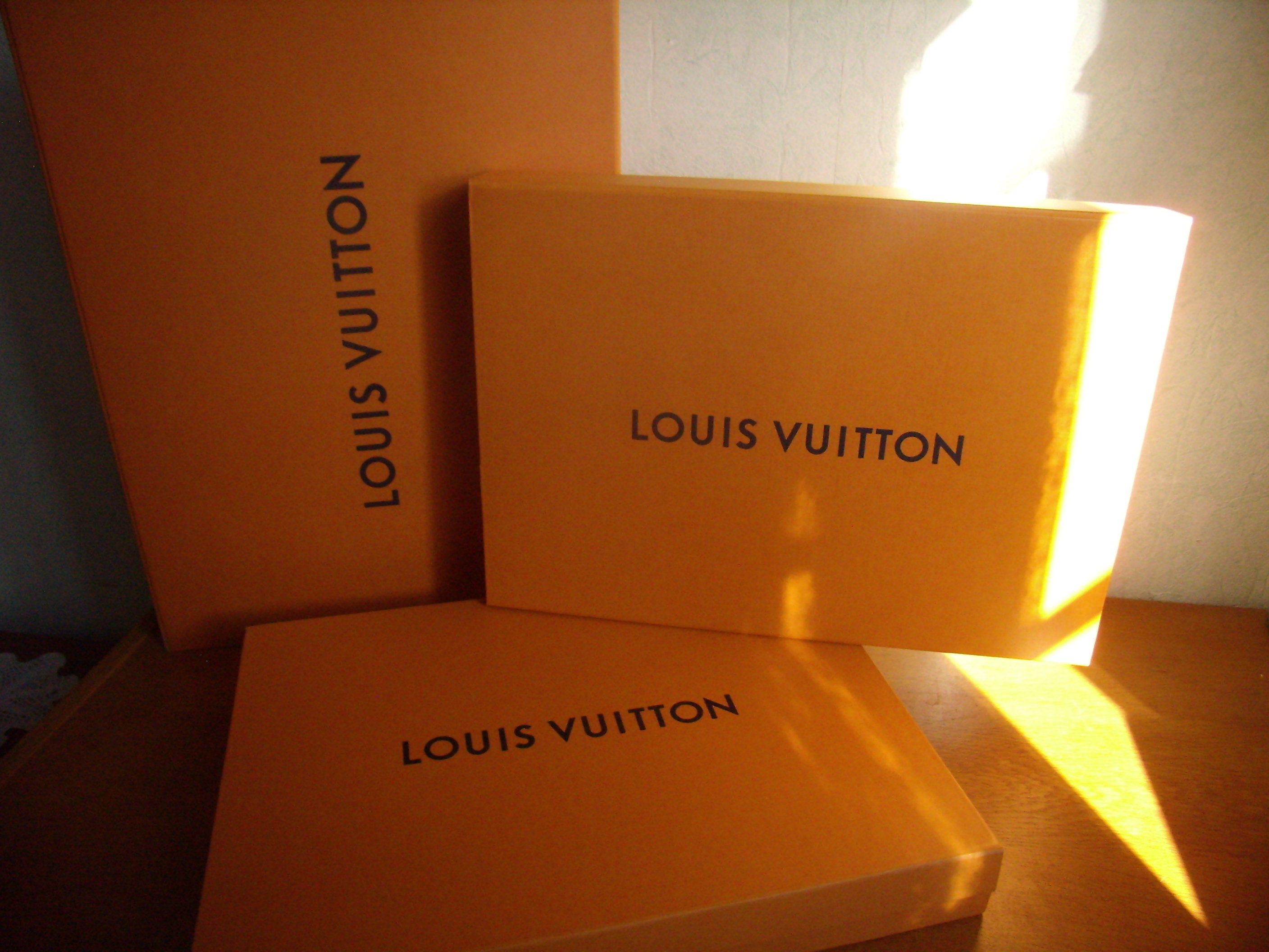 Classic Famous Louis Vuitton Orange Product Box Packaging with a