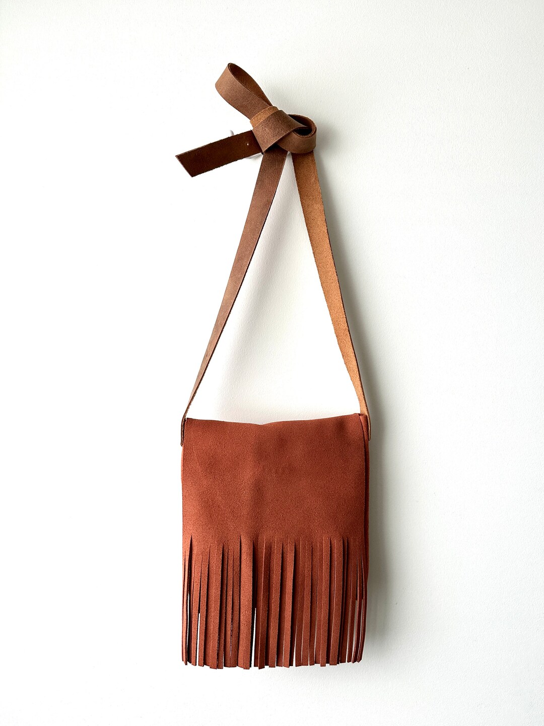 AVERY FRINGE SUEDE CROSSBODY