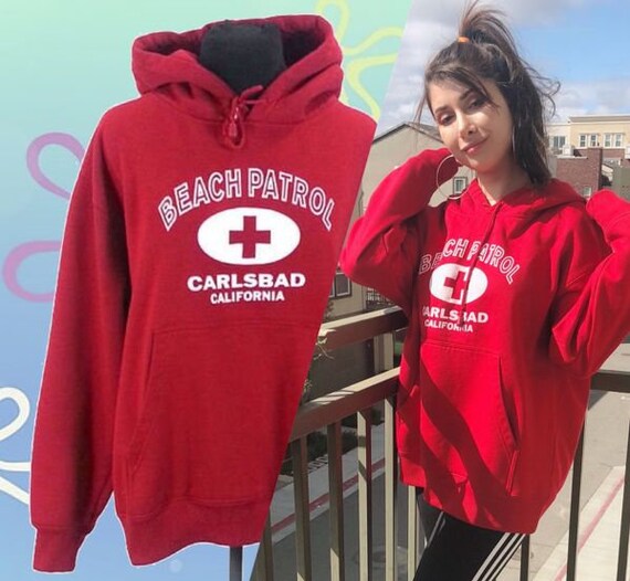 red lifeguard sweater