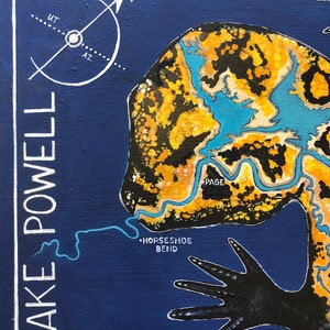 May include: A hand-painted illustration of Lake Powell, a reservoir on the Colorado River in Arizona and Utah. The illustration shows the lake's shape, with a blue outline and a yellow and black interior. The text "LAKE POWELL" is written vertically on the left side of the image. The text "PAGE" is written in the upper right corner of the image. The text "HORSESHOE BEND" is written in the lower left corner of the image.