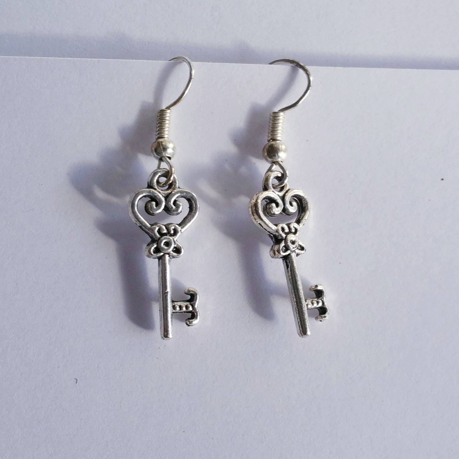 Heart key earrings deals