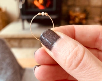 one of a kind!! Simple, delicate white freshwater pearl with 24kt gold plated band