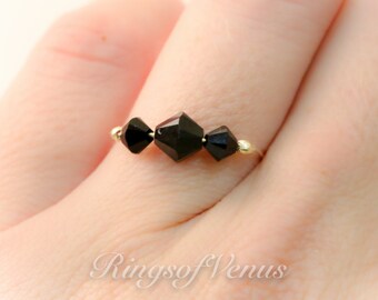 Anillo apilable de oro con cristales Swarovski negros