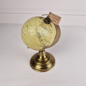 Vintage Globe destination wedding centerpiece.