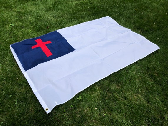 white flag with blue square and red cross white flag with blue square and red cross