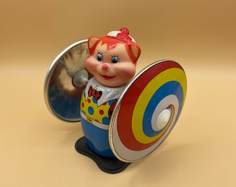 Vintage 90s Tin Toy Bear with Spinning Arms, Wind-Up Carnival Toy