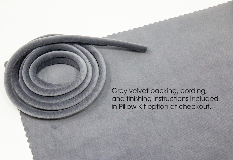 May include: Gray velvet cording for upholstery projects. The cording is rolled up on a gray fabric surface. The text "Grey velvet backing, cording, and finishing instructions included in Pillow Kit option at checkout." is printed on the fabric.