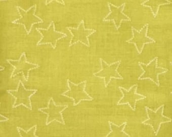 May include: A close-up of a fabric featuring a light green background with white star outlines. The stars are evenly spaced and have a dotted pattern. The fabric has a slightly textured appearance.