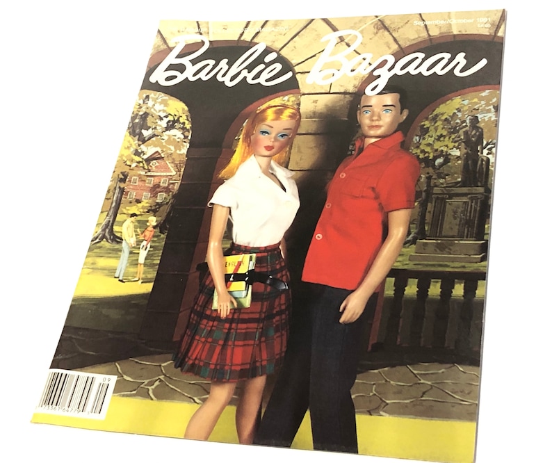 May include: A vintage Barbie Bazaar magazine cover featuring a Barbie doll wearing a white shirt and a red and black tartan skirt, and a Ken doll wearing a red shirt and blue trousers. The cover features the text "Barbie Bazaar" in a white font.