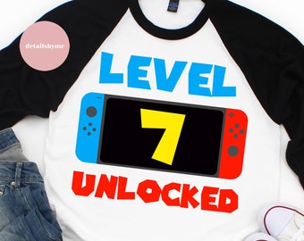 Nivel 7 desbloqueado svg 7th cumpleaños niño siete años de edad Gamer divertidos niños ordenador videojuego Svg PNG Eps, archivos de corte, Cricut Silueta Cameo