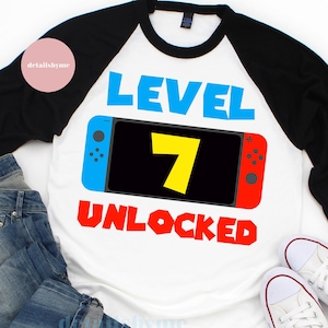Ebene 7 entsperrt Svg 7. Geburtstag junge sieben Jahre alte Gamer lustige Kinder Computer Videospiel Svg PNG Eps, geschnittene Dateien, Cricut Silhouette Cameo