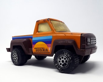 Orange Tonka pickup truck toy from the 70s