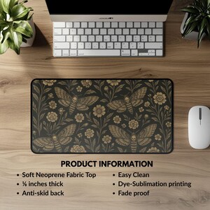 May include: A rectangular black mousepad featuring a repeating pattern of moths with skull-like markings and floral elements in gold. The mousepad is made of soft neoprene fabric, is approximately 0.3 cm thick, and has an anti-skid back.