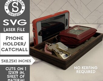 May include: A wooden phone holder and catchall tray with a red phone case, a red wallet, and keys. The tray is 5 inches wide by 8.25 inches long and 1 inch tall. The design is cut from a 12x19 inch sheet of material. No kerfing is required.